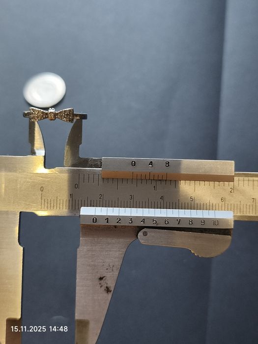 Pierścionek kokardka z kryształkami, srebro 925, średnica 17,6 mm