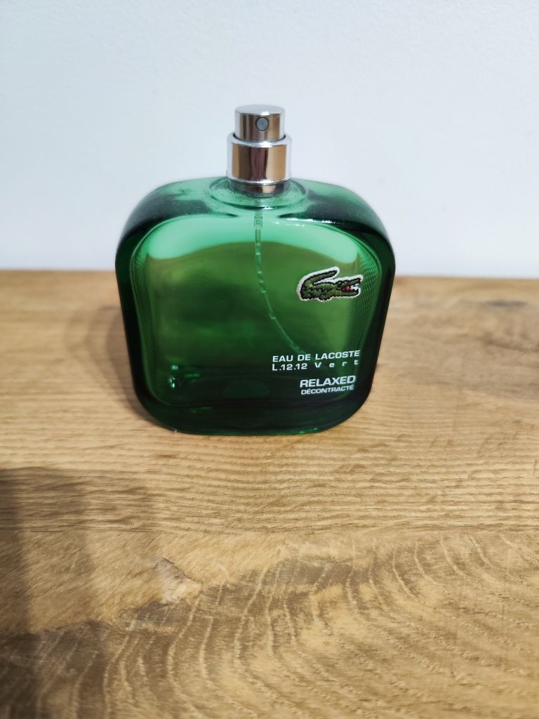 Pusta butelka po perfumach Lacoste