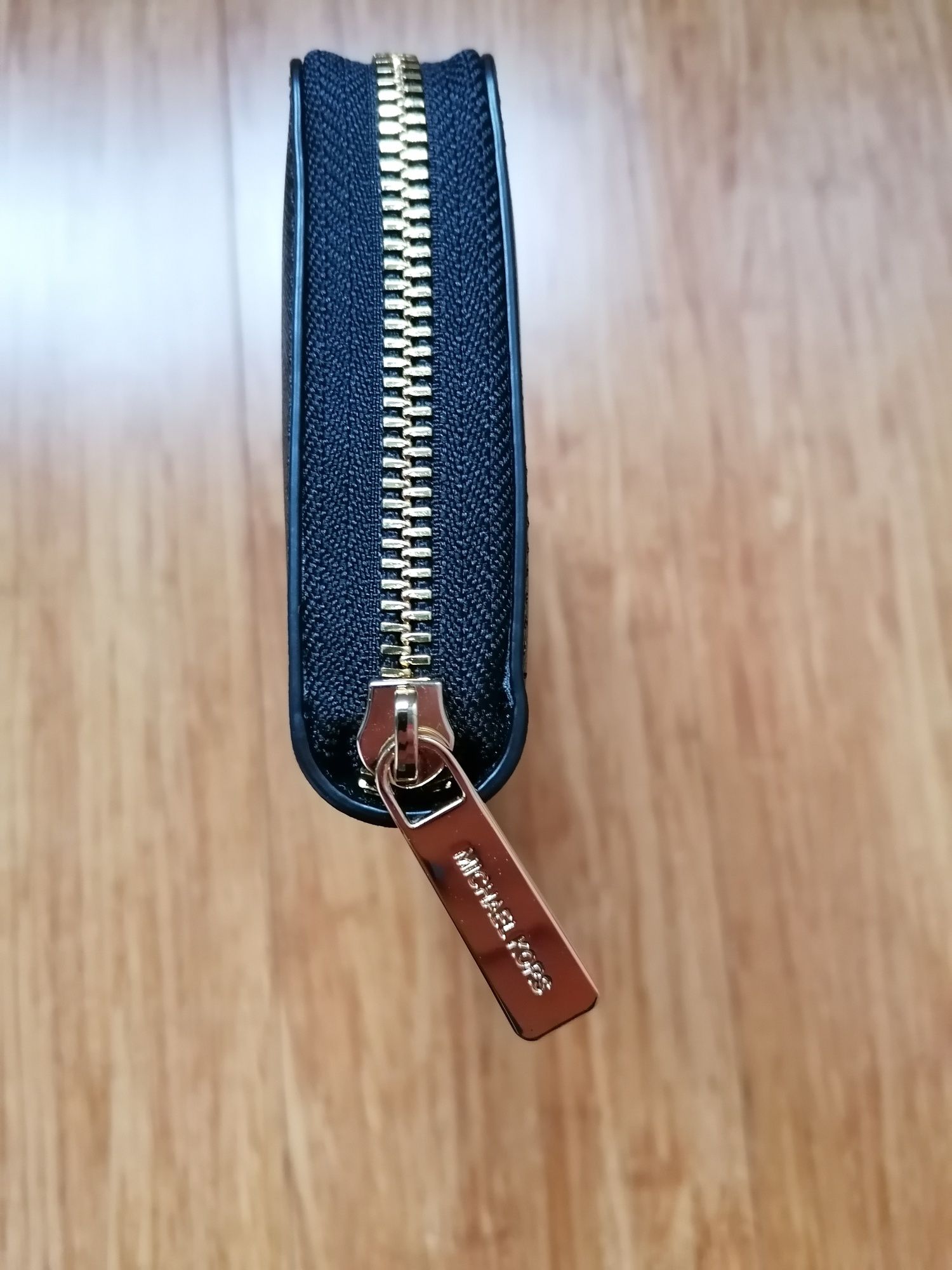 Nowy, piękny, skórzany portfel Michael Kors.