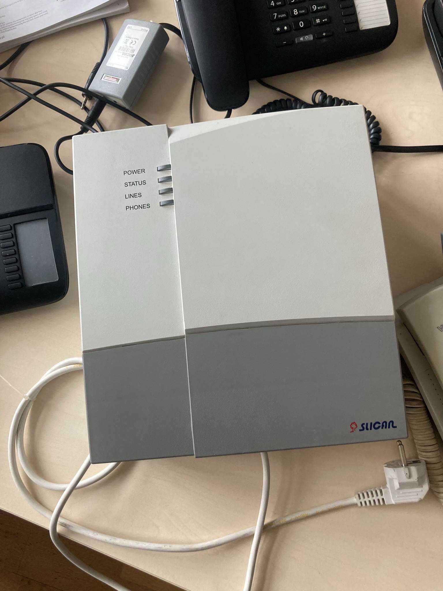 Centrala telefoniczna Slican CXS-0424.WM + wyposażenie