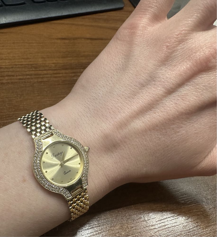 Zegarek Prestige złoty pr.585 + szafir