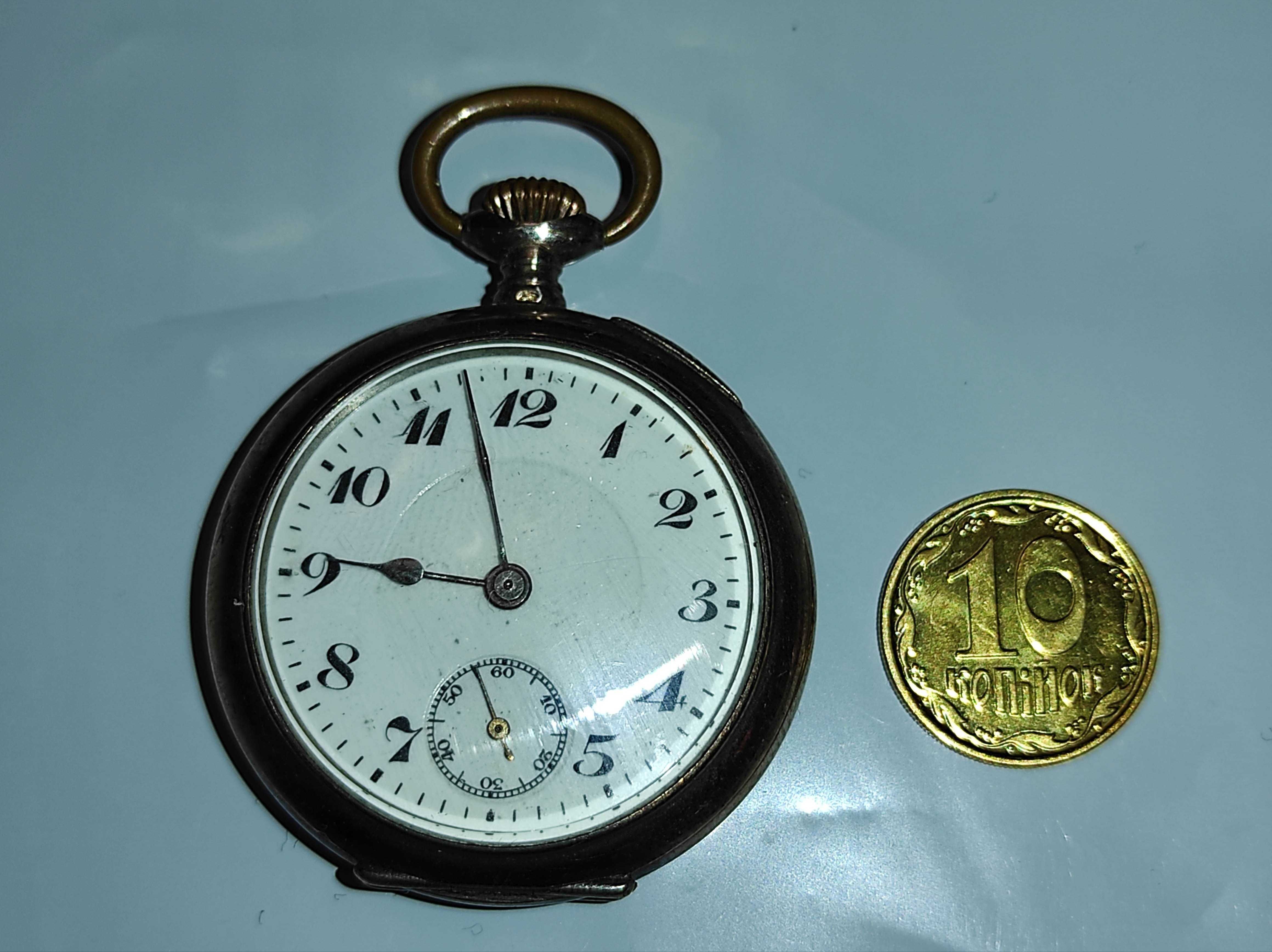 Обмін маленький срібний карманний годинник