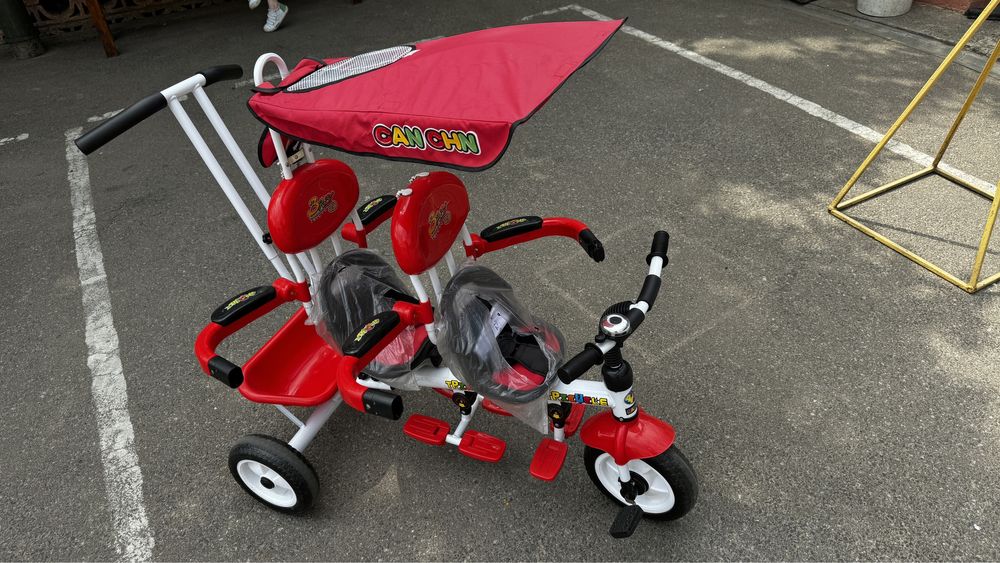 Велосипед для блізняшок