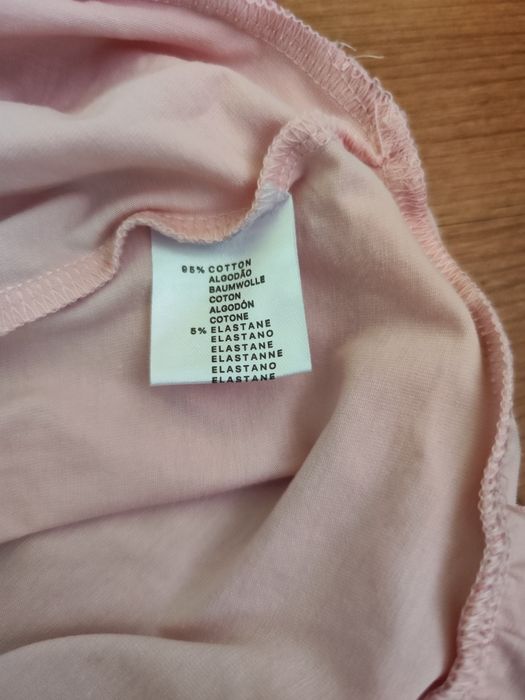 T-shirt rosa de menina da Ativo