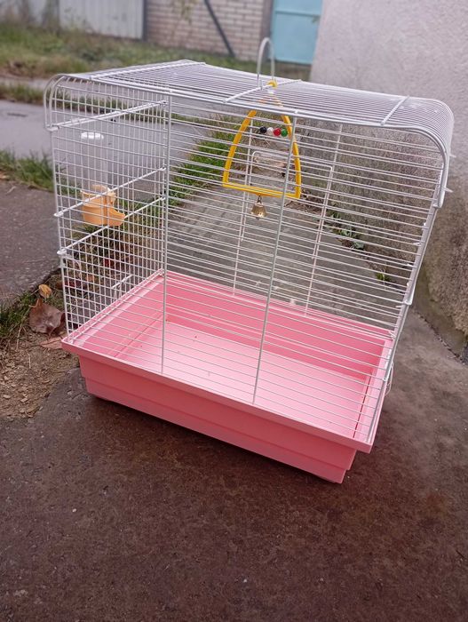 Продам велику клітку для папуги