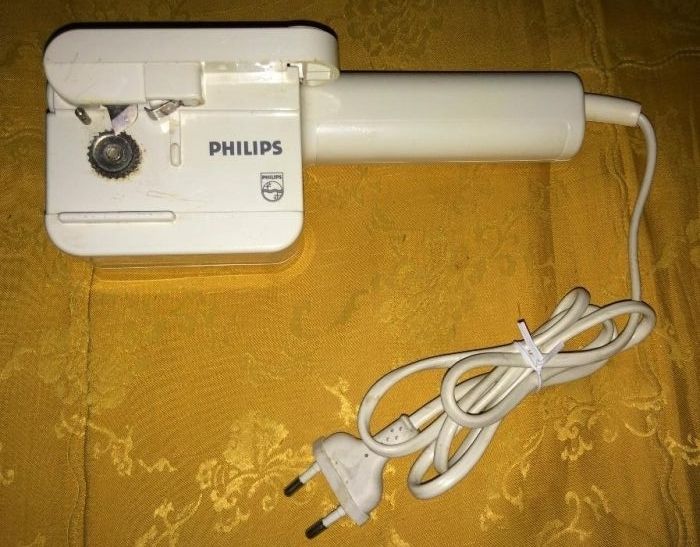 відкривач консервів електричний Philips