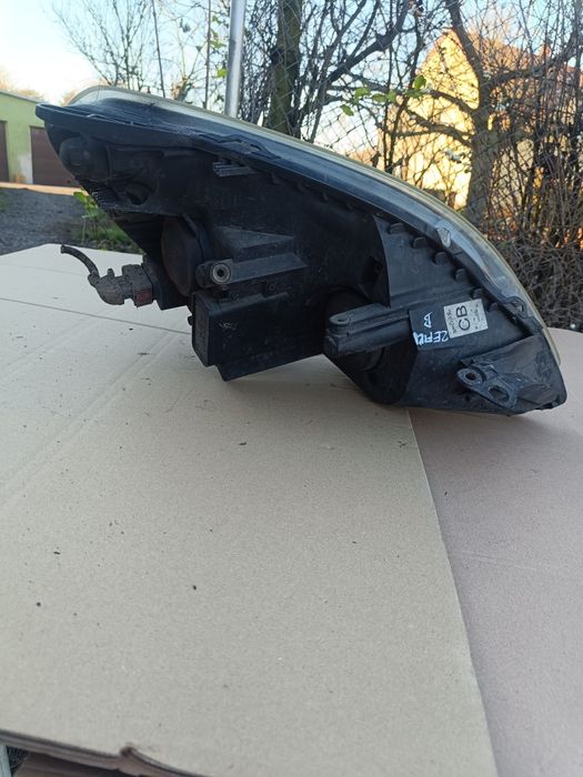 Lampa lewa przednia Opel Zafira B