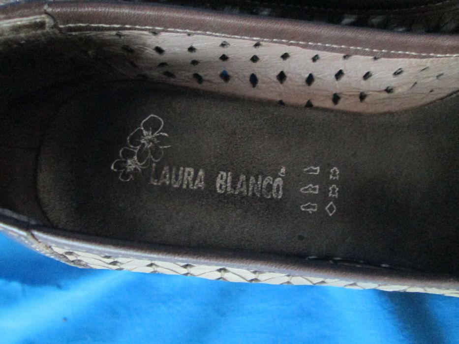Sapatos meia estação em pele