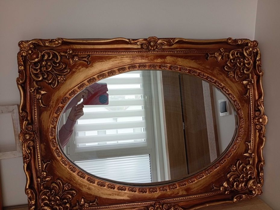 Lustro owalne z rama w kolorze miedzi