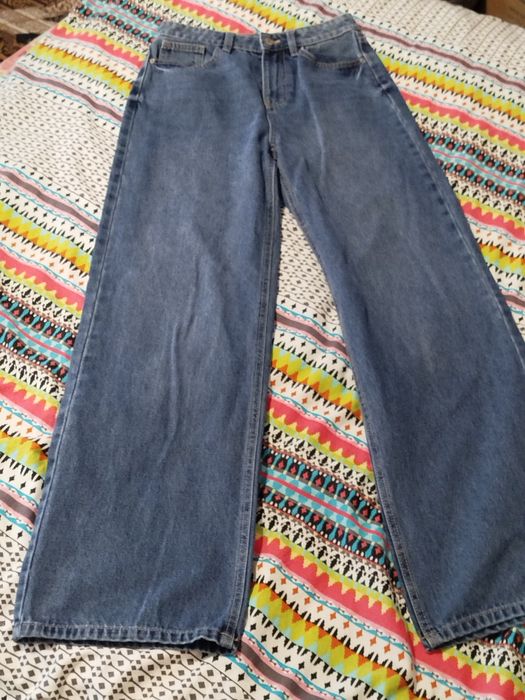 Nowe niebieskie spodnie jeansowe z szeroką nogawką Sinsay XS 34 wide l