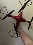 Drone syma x8hg 2 baterias e 4 helices suplentes