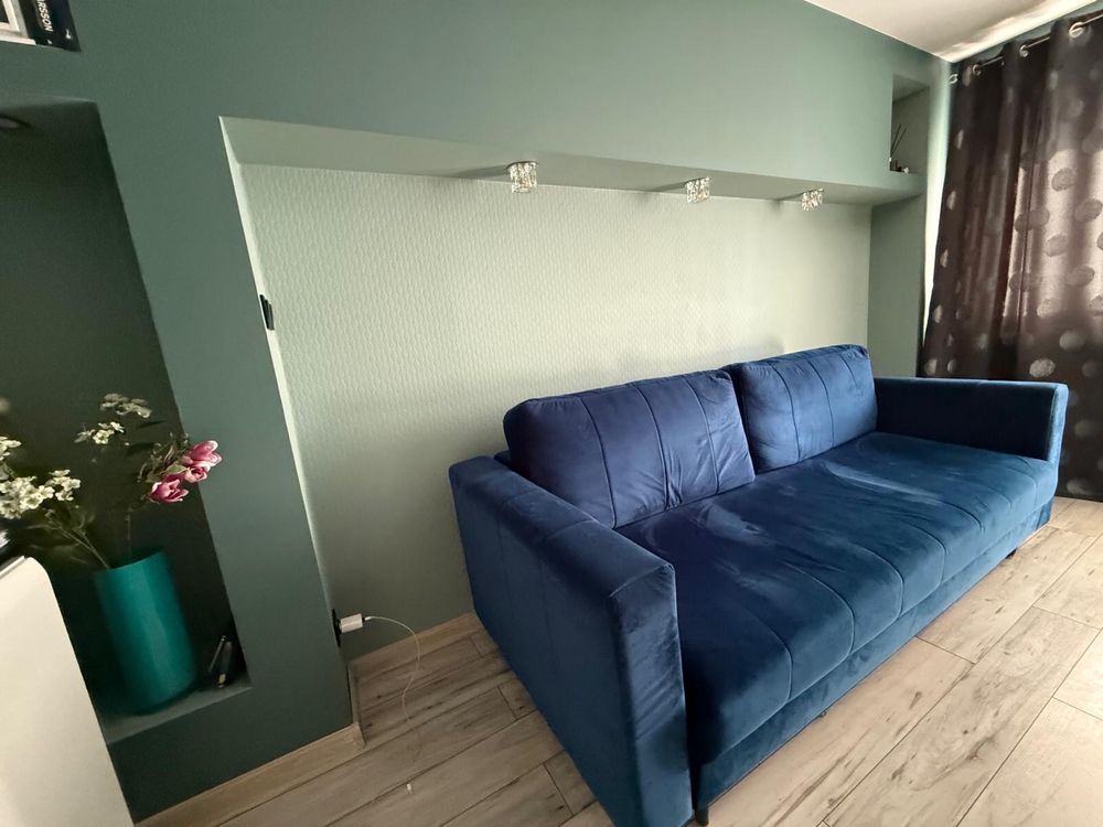 Sofa z funkcją spania granatowy welur