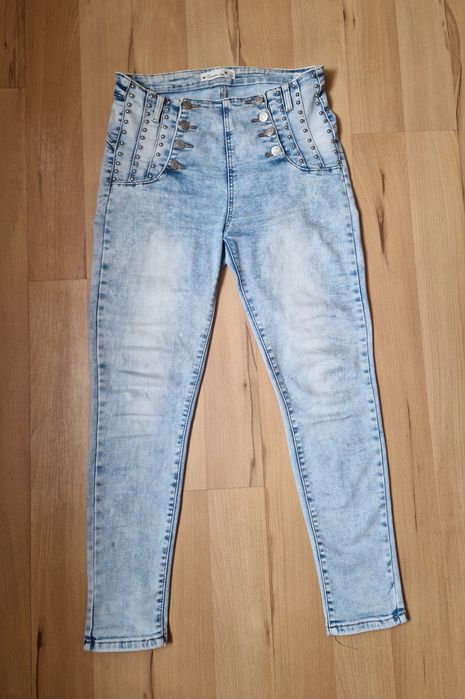 Sprzedam spodnie jeansowe damskie XL Nowe