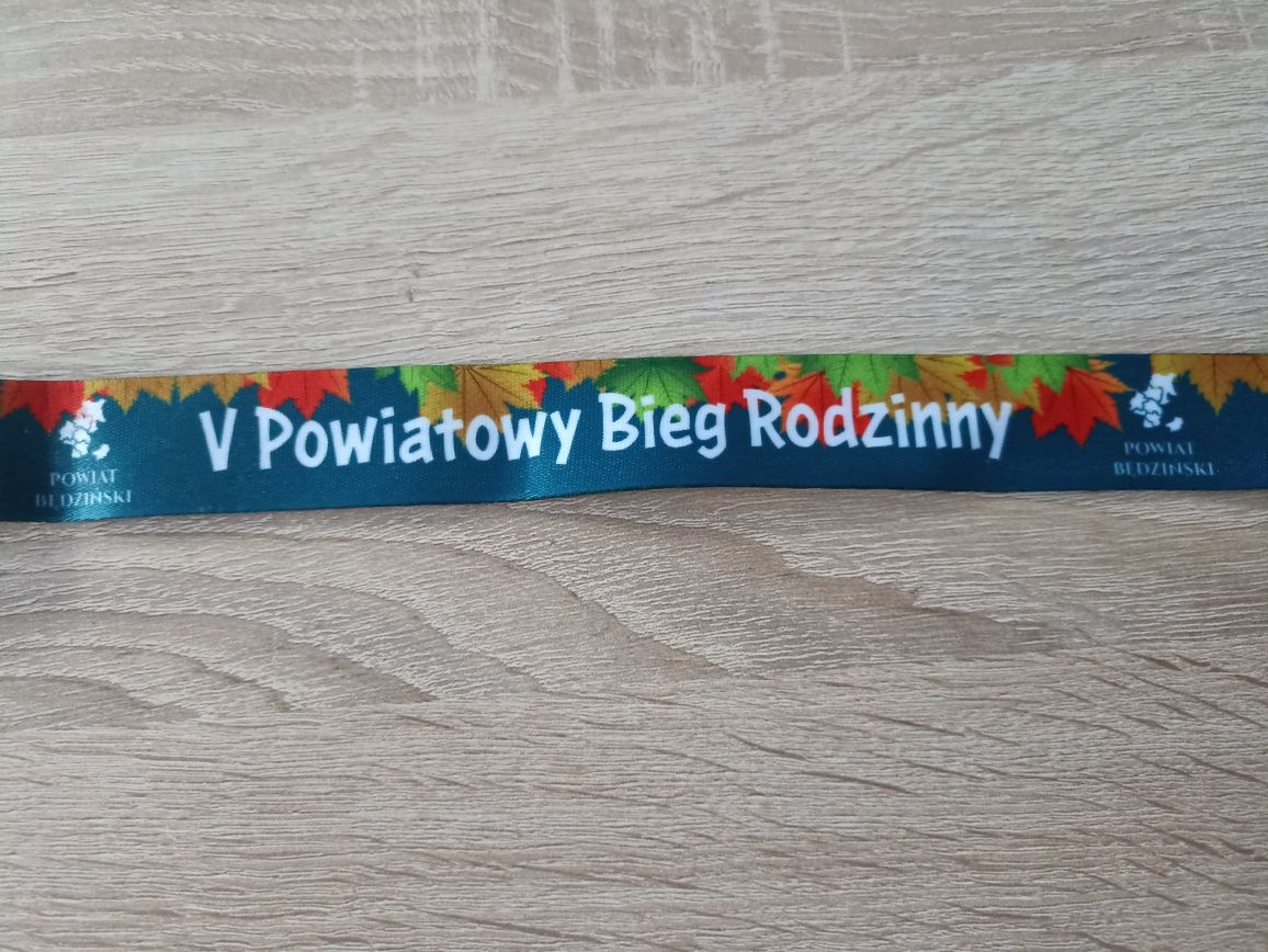 Medal i numer startowy "V Powiatowy Bieg Rodzinny" Będzin 21.09.2024