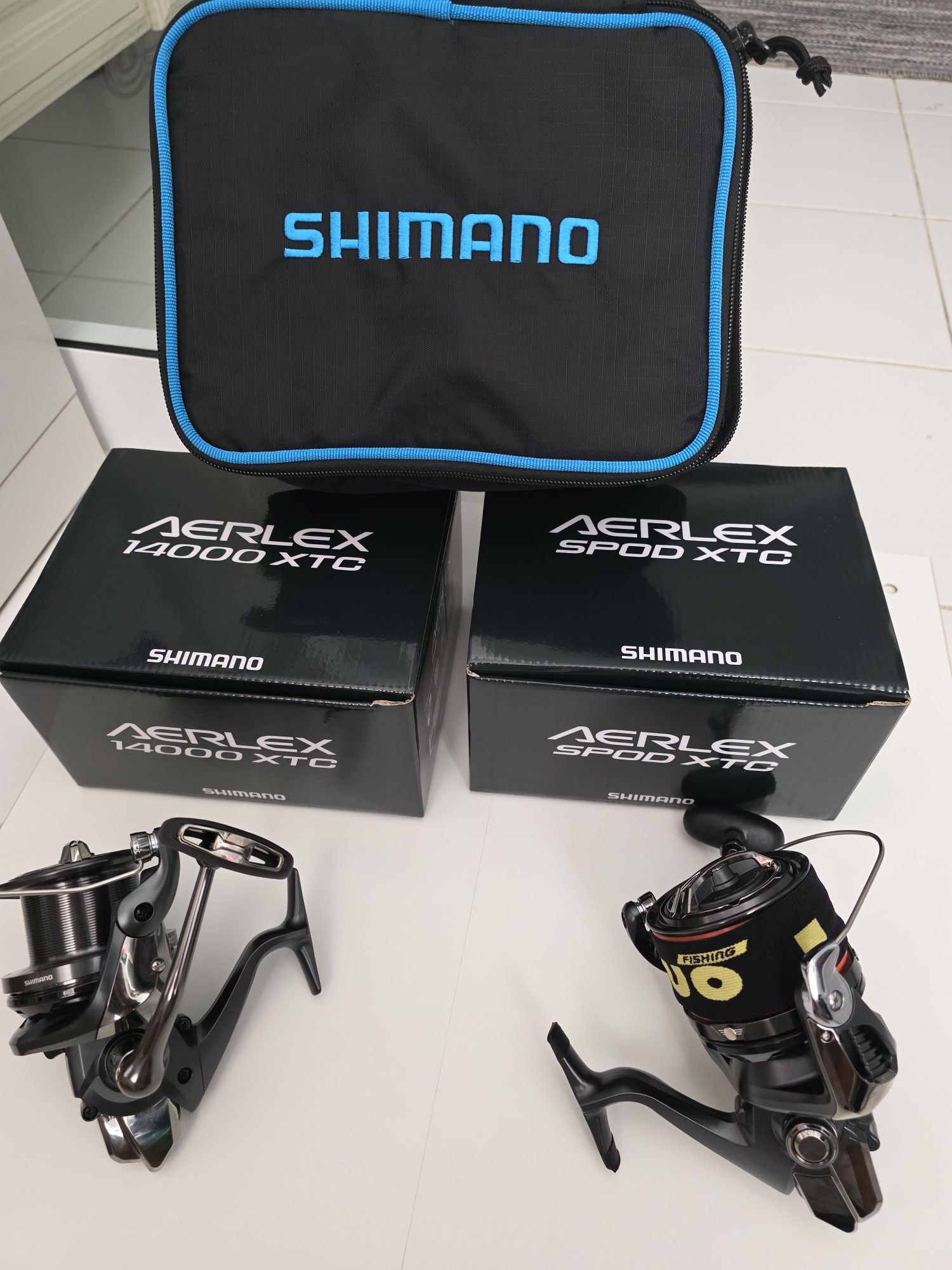 2 Carretos shimano ,cana vega potenza metálica