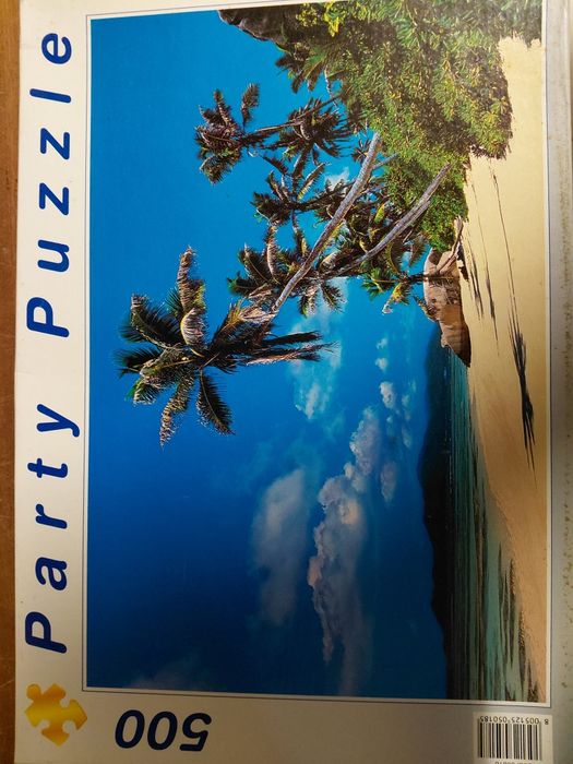 Caixa com 18 puzzles