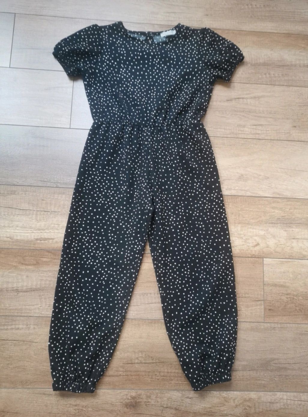 Kombinezon Primark 122 czarny w kropki