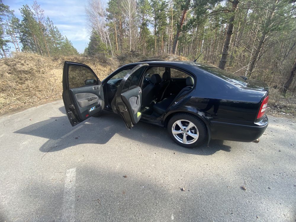 Шкода тур 1.8 автомат