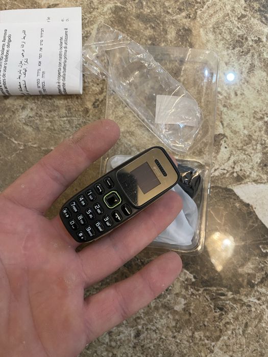 Є в наявності ! Міні телефон розміром пелець SERVO BM310