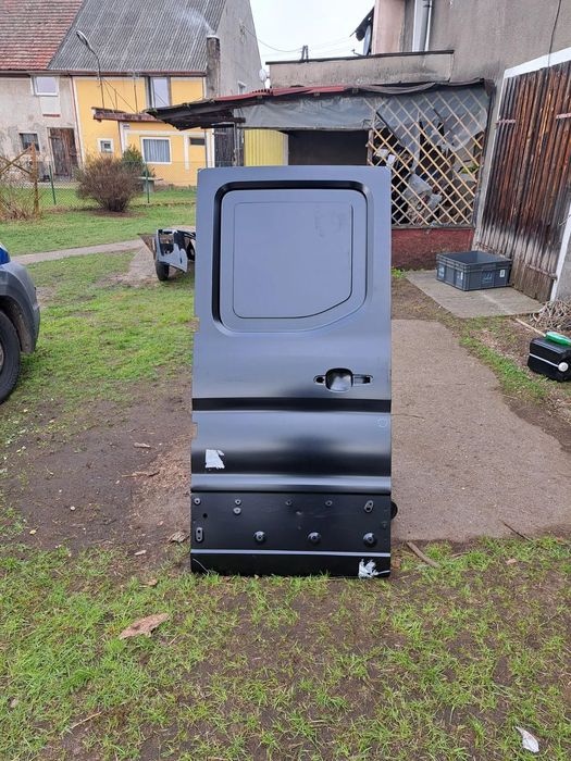 Drzwi lewe tylne tył Ford Transit MK-8 Doka Dubel Kabina PFK3V-D24631-AC 2386629 Drzwi lewy tył tylne Ford Transit MK-8 Doka Dubel Kabina PFK3V-D24631-AC 2386629