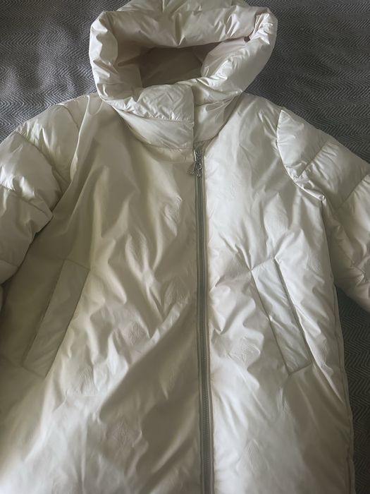 Продам  женский пуховік