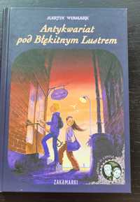 Antykwariat pod błękitnym lustrem - M.Widmark