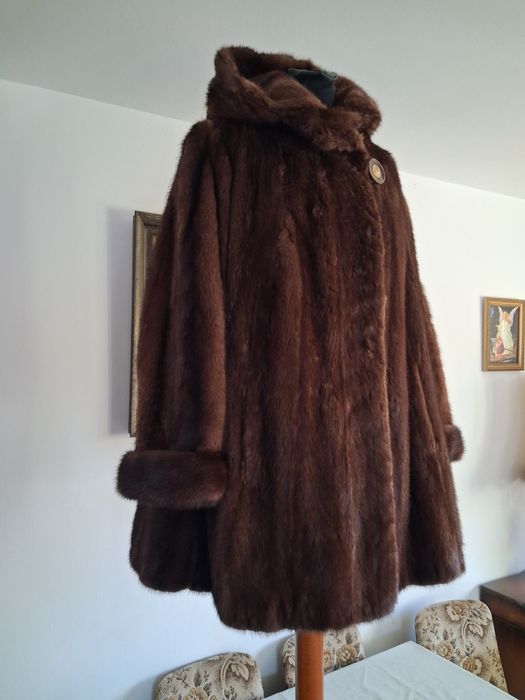 Norki.. futerko koloru brązowego z kapturem