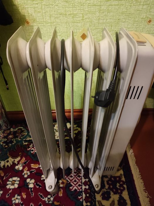 Масляный обогреватель.