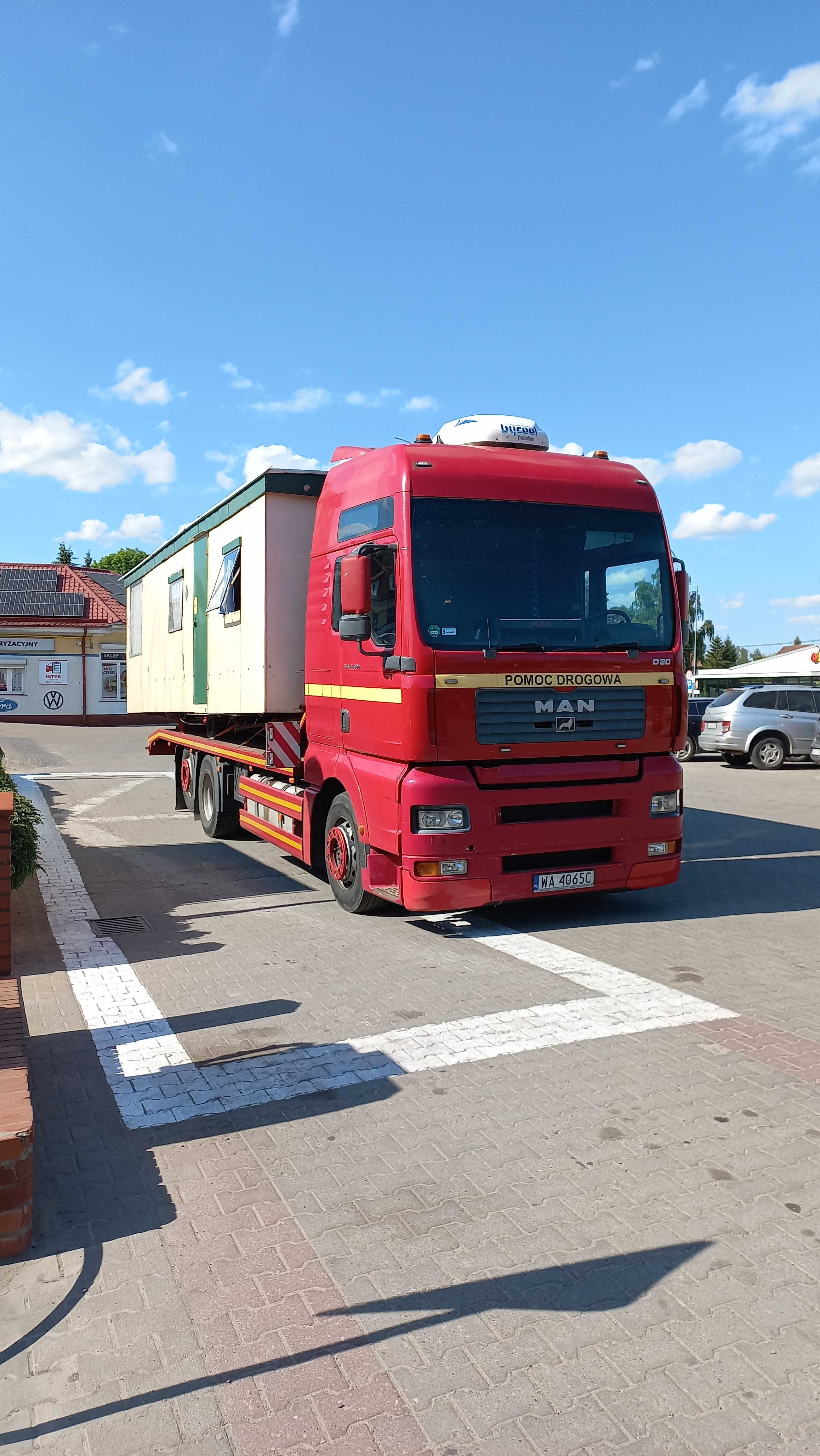 Auto laweta Pomoc drogowa  Gizycko 24/7 transport maszyn rolniczych