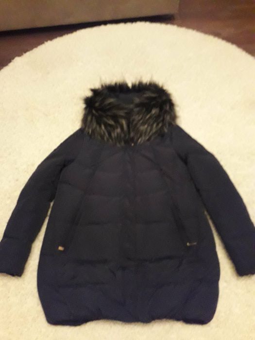 женский пуховик Zara.