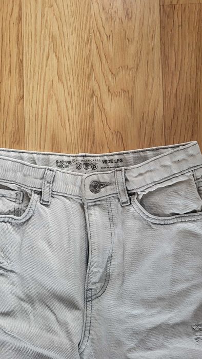 Spodnie dziewczęce jeansowe z dziurami