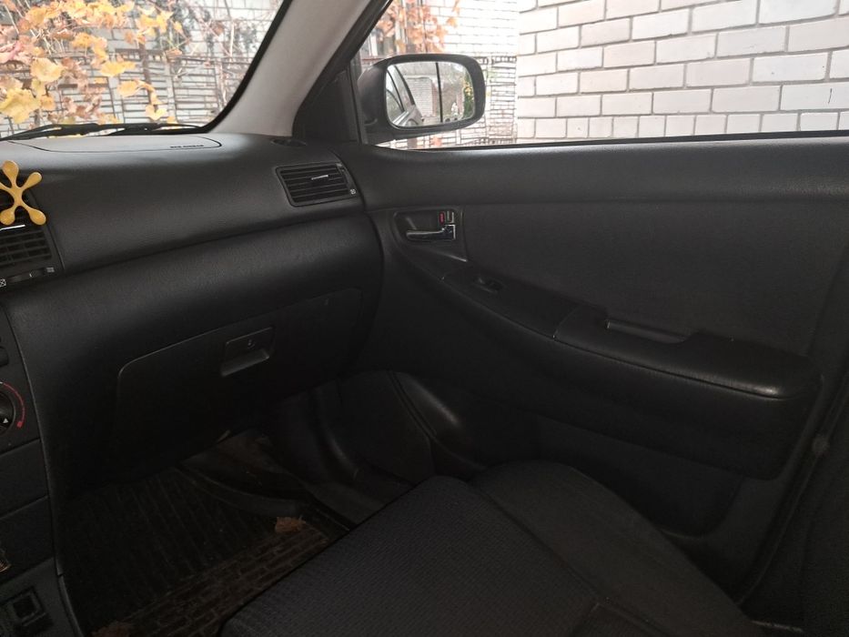 Тойота корола е120