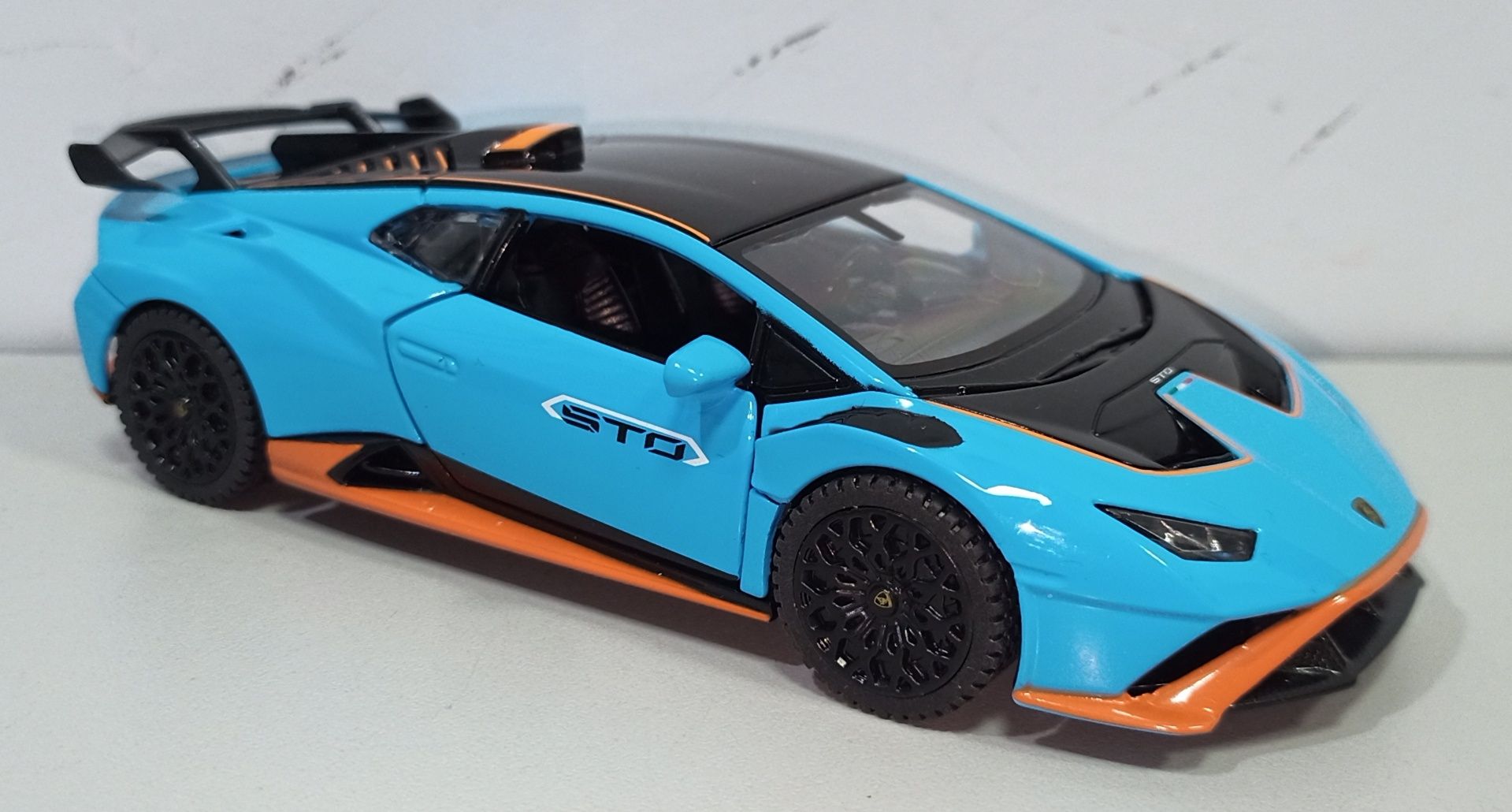 Lamborghini Huracan STO металлическая модель 1:32 RASTAR