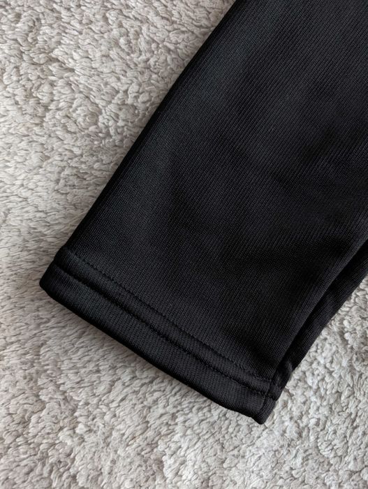 Czarne ocieplane futerkiem spodnie legginsy 128 - 134 - 140 jak nowe