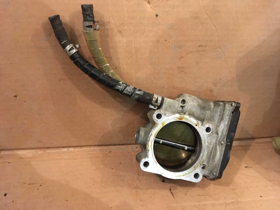 Дросільна заслінка в зборі 220300P050 Toyota Camry Lesus ES