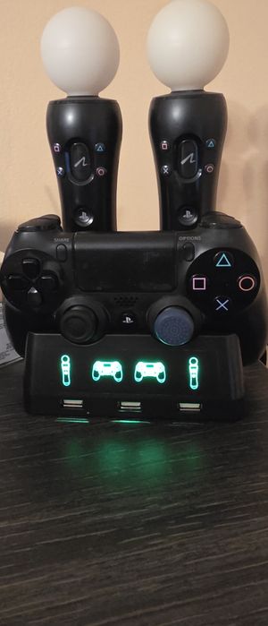 Konsola PS4+VR+stacja ladowania+dysk+kierownica+pistolet+11gier