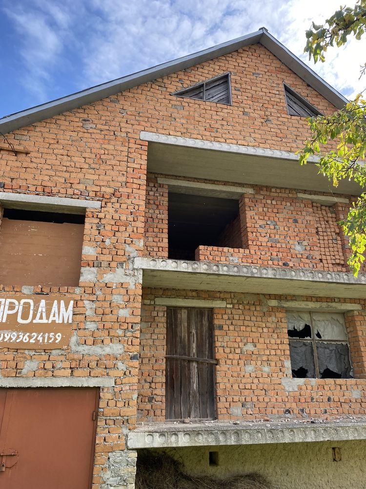 Будинок і земельна ділянка в м.Дунаївці