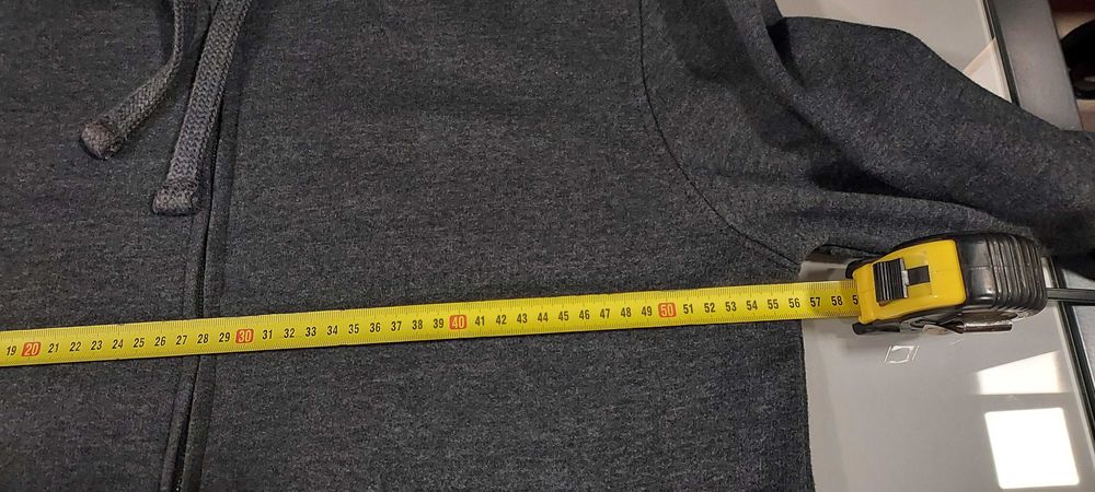 Casaco cinza In Extenso