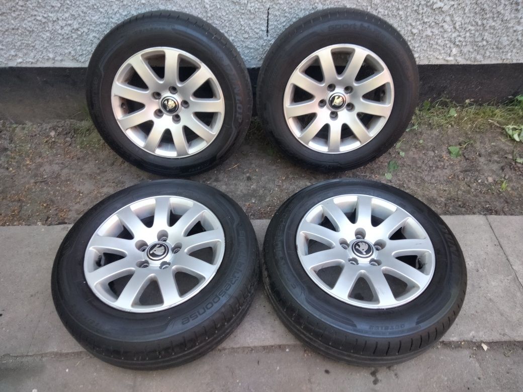 Koła aluminiowe Skoda 5x112  ET 37 Dunlop 195/65R15 po 7,5 mm