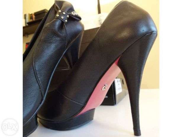 Sapatos da marca Carmen Steffens