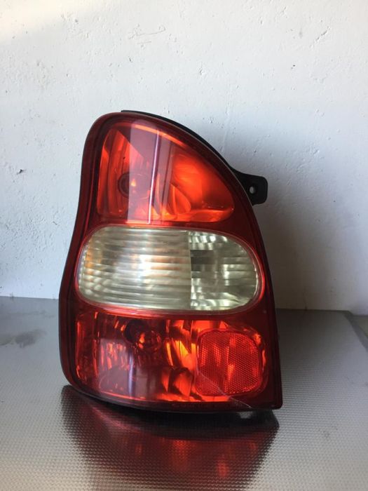 Farolim esquerdo KIA Carnival II (GQ)