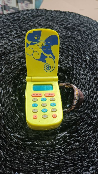 Zabawka telefon z otwieraną klapką żółty