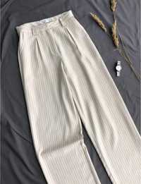 Бежеві брюки палаццо від na-kd