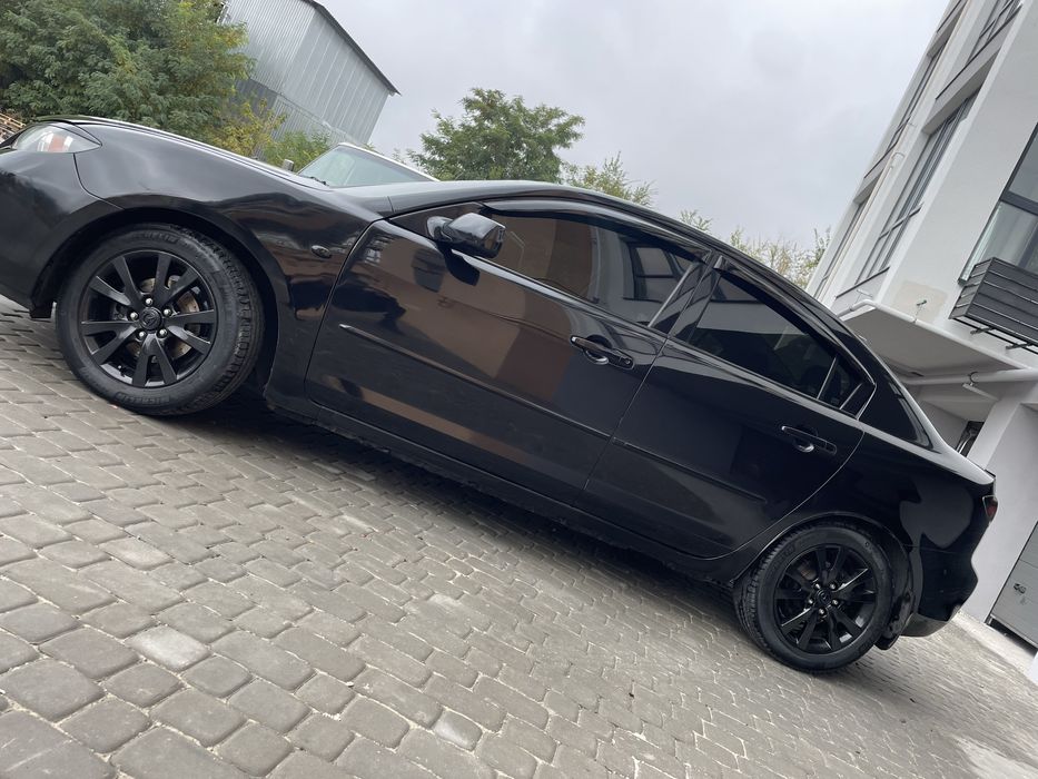 Мазда 3 ………………………….