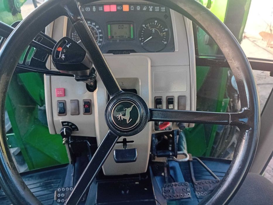 Ciągnik John Deere 6120 z turem