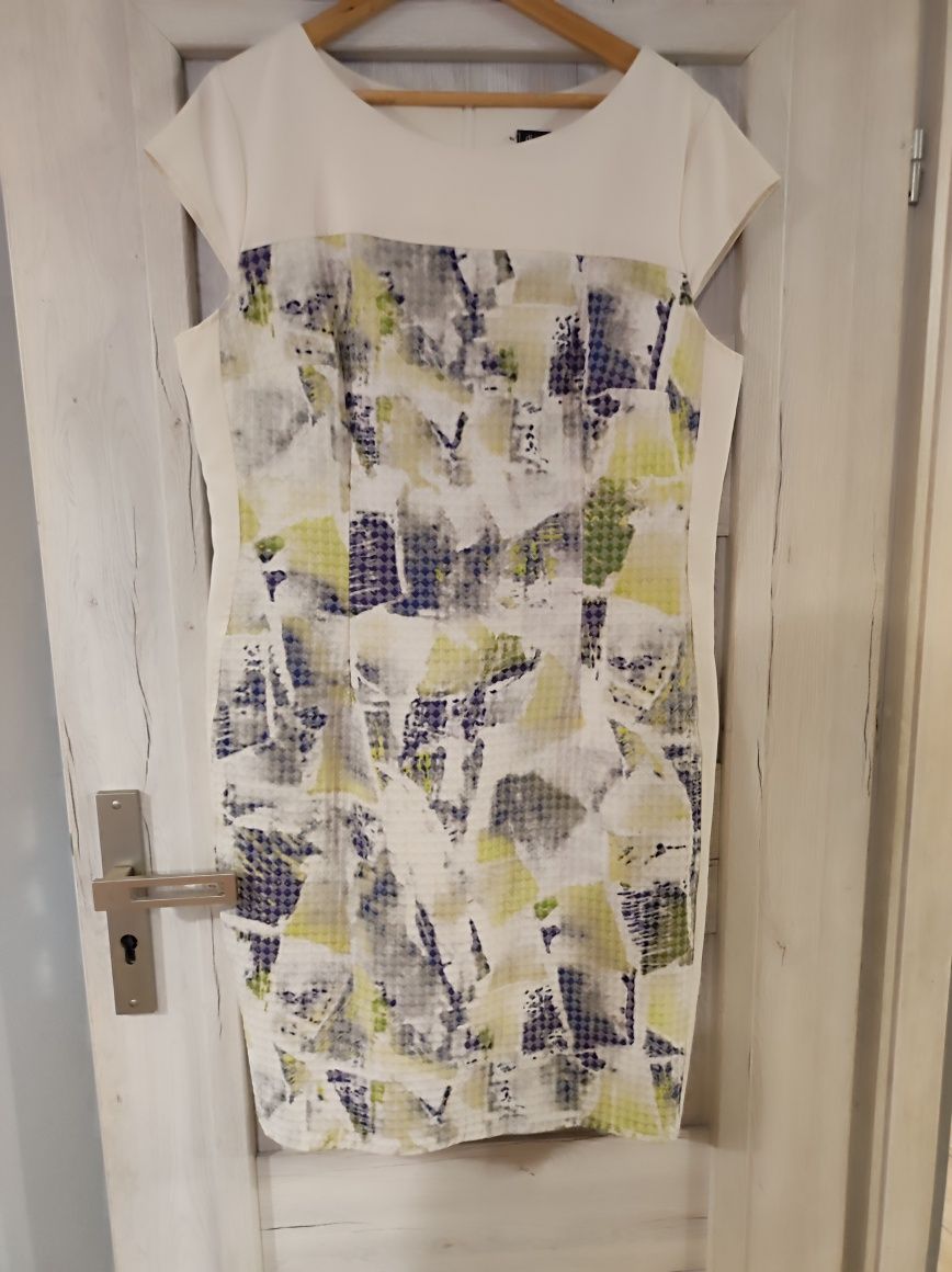 Elegancka sukienka polskiego producenta rozmiar 48.