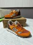 Sapatilhas NB cor laranja