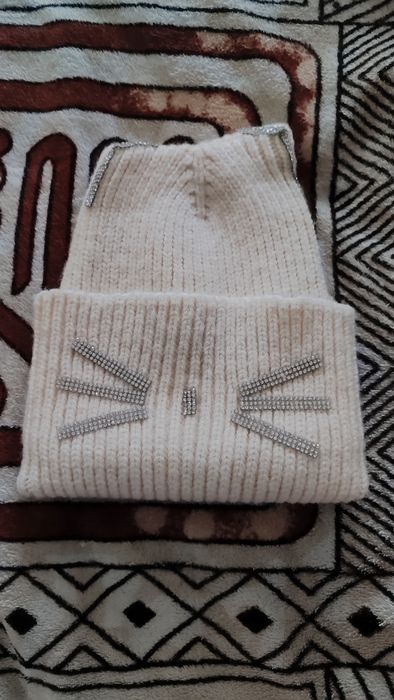 Продам новую шапку ,кошка