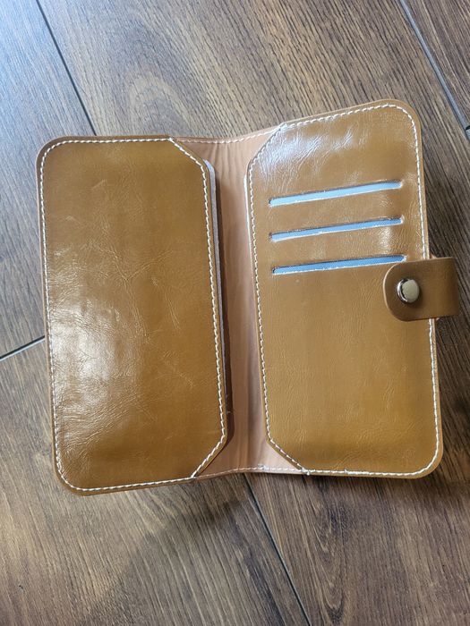 Pokrowiec etui portfel Premium brązowy 4,0-4,7 cala