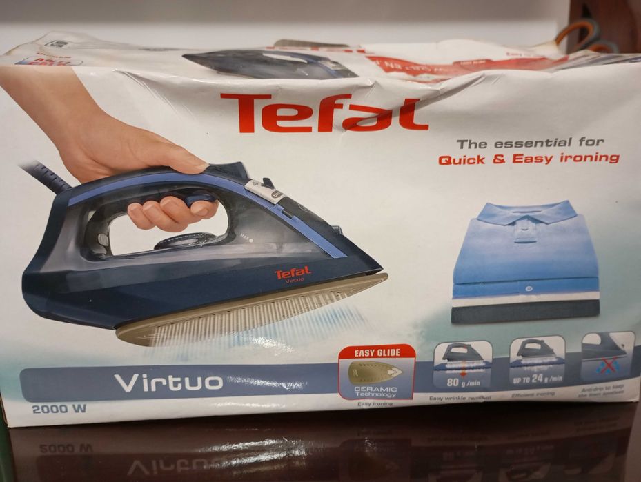 Ferro de passar roupa novo